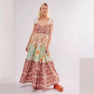 Pastel Floral Maxi Dress with Adjustable Shoulder Ties and Pockets